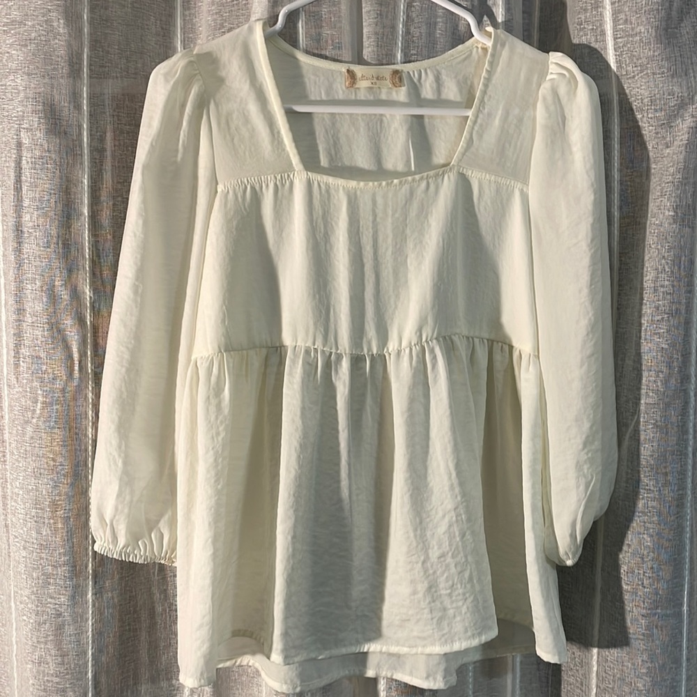 cream blouse